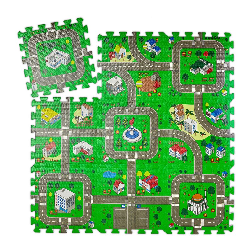Bunte Spielmatte mit Straßenmotiv, bestehend aus Puzzleteilen, auf grünem Hintergrund.